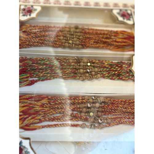 Traditional Multicolor Beaded Rakhi Set – 12 PC