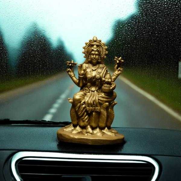 Laxmi ji on Lotus Car dashboard